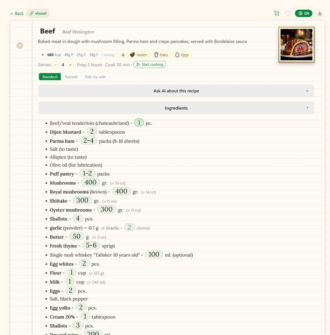 A recipe saved in iwant2eat: Beef Wellington, showing per-serving calories and macros, gluten, dairy and egg allergen tags, an adjustable serving count, a Start cooking button, an Ask AI panel, and a parsed ingredient list with quantities in both metric and imperial.